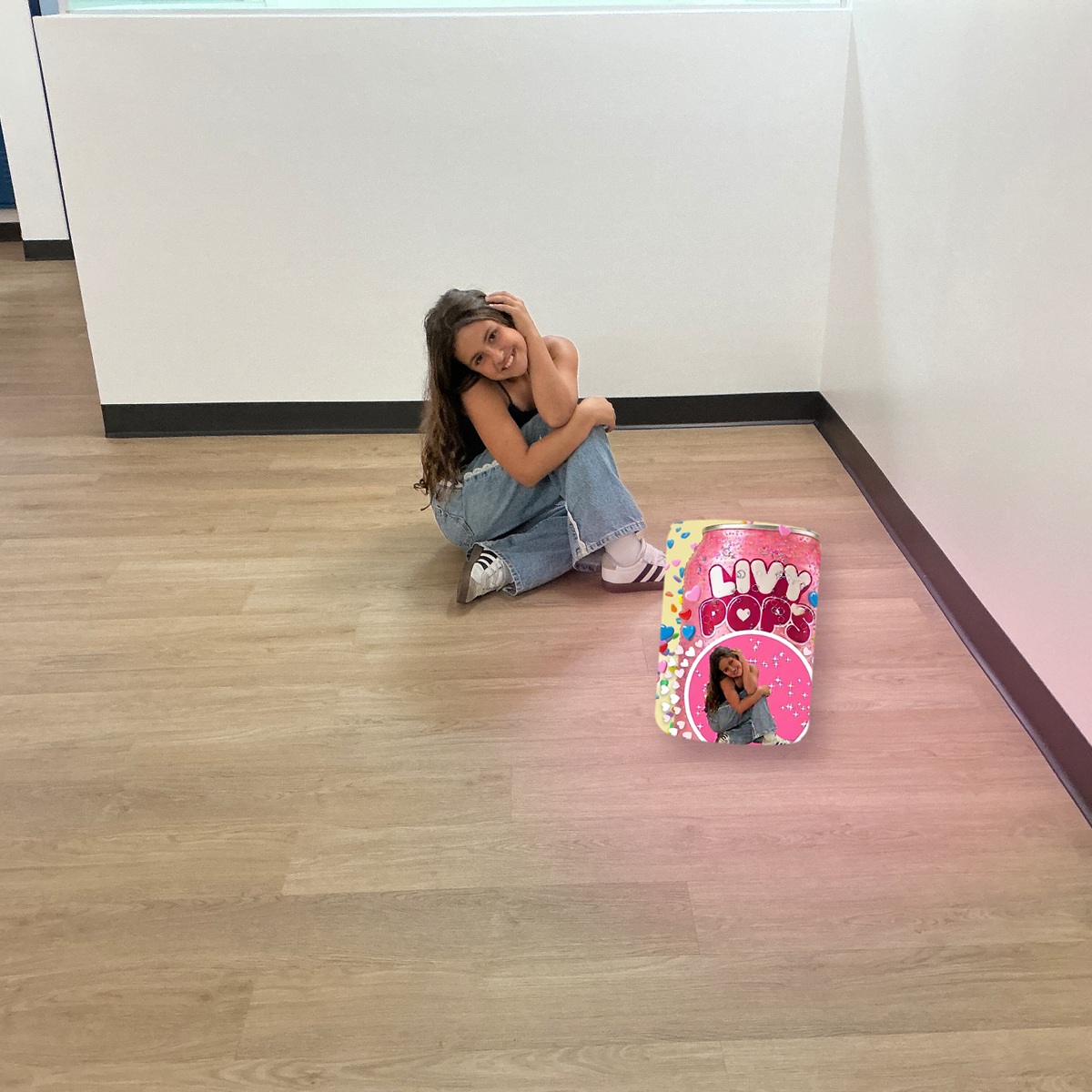 Olivia Mehran with the healthy pink Livy Pops soda she created